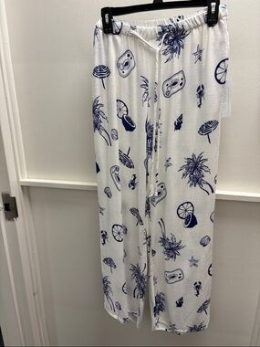 Sienna Sky White Wide-Leg Pants with Navy Tropical Motif- NWT